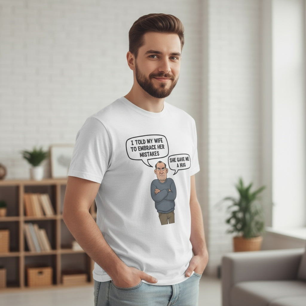 Cartoon husband with speech bubble “I told my wife to embrace her mistakes, she gave me a hug” – funny, inappropriate marriage joke t-shirt by Cheeky Tees Co